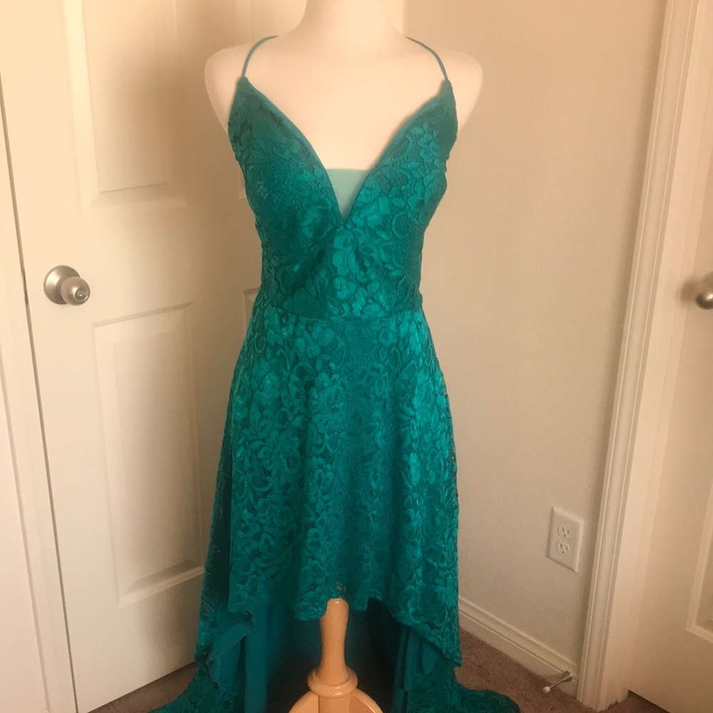 Elegant Teal Lace Women’s Dress with pockets.